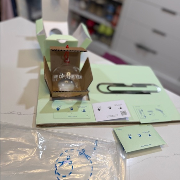 Off-White Clear Glass Holiday Ornament with Red Ribbon - Picture 5 of 6